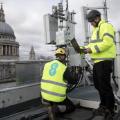 Engineers from EE the wireless network provider owned by BT Group Plc, inspect Huawei Technologies Co. 5G equipment overlooking St. Paul&#39;s Cathedral during trials in the City of London, U.K., on Friday, March 15, 2019. Europe would fall behind the U.S. and China in the race to install the next generation of wireless networks if governments ban Chinese equipment supplier Huawei Technologies Co. over security fears, according to an internal assessment by Deutsche Telekom AG. Photographer: Simon Dawson/Bloomberg via Getty Images