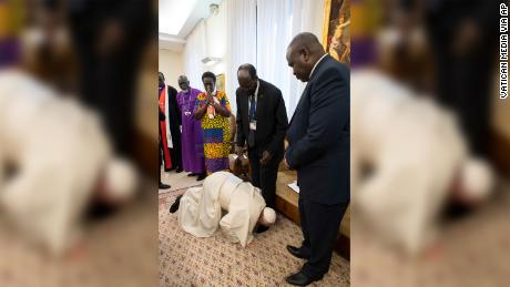 Pope Francis kneels to kiss the feet of South Sudanese President Salva Kiir Mayardit at the Vatican.
