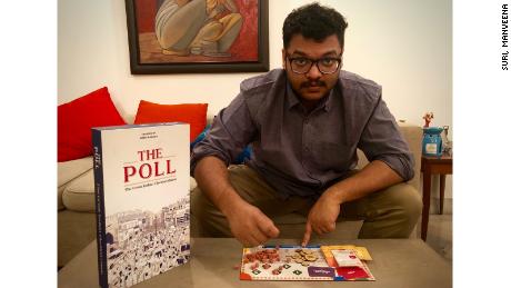 Abeer Kapoor with the board game he invented that was inspired by India&#39;s political system.