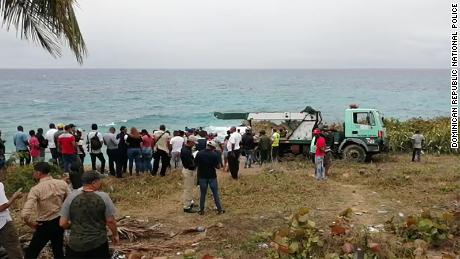 People gathered at the extraction site.