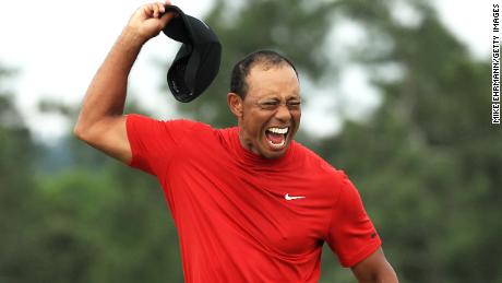 Woods celebrates after sinking the putt that clinched a fifth Masters title -- 14 years after his last.