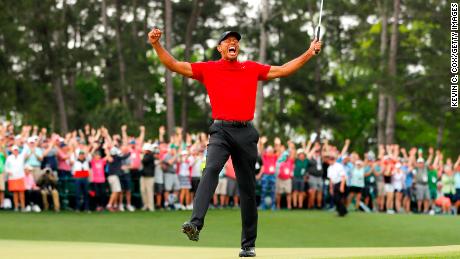 AUGUSTA, GEORGIA - APRIL 14: Tiger Woods of the United States celebrates after sinking his putt on the 18th green to win during the final round of the Masters at Augusta National Golf Club on April 14, 2019 in Augusta, Georgia. (Photo by Kevin C. Cox/Getty Images)