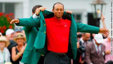 AUGUSTA, GEORGIA - APRIL 14: Tiger Woods (R) of the United States is awarded the Green Jacket by Masters champion Patrick Reed (L) during the Green Jacket Ceremony after winning the Masters at Augusta National Golf Club on April 14, 2019 in Augusta, Georgia. (Photo by Kevin C. Cox/Getty Images)