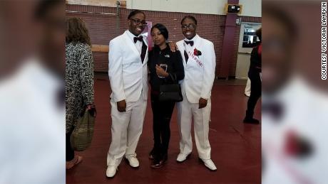 Deontre, left, and Deontae, with their mother, Victoria Lampkin.