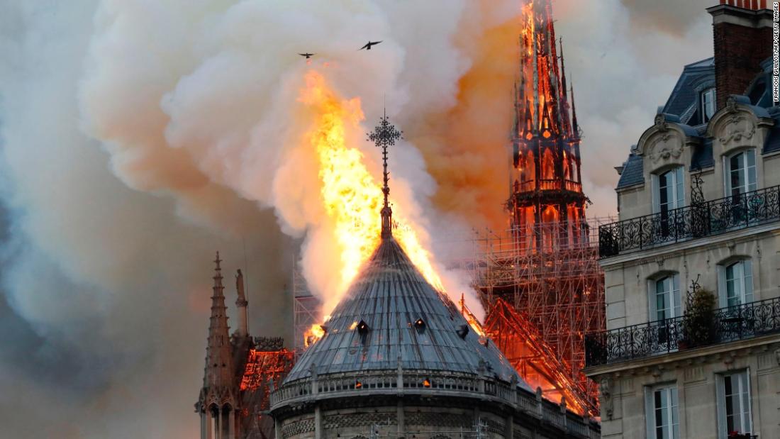 Smoke and flames rise from Notre Dame cathedral on April 15, 2019.