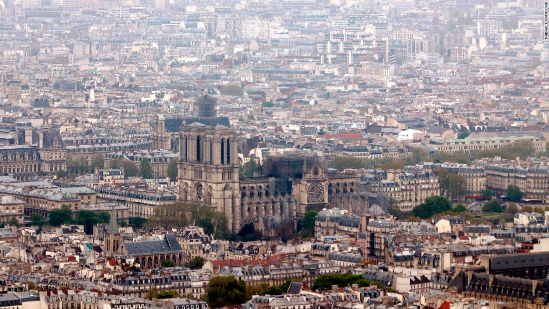 The burnt out cathedral is seen from the top of the Montparnasse tower the day after the fire.