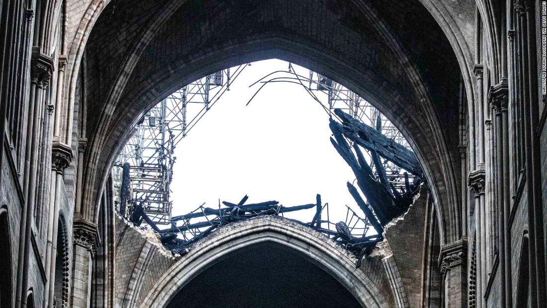 Daylight shines through the fallen roof of Notre Dame on April 16, 2019.