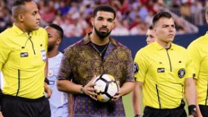 HOUSTON, TX - JULY 20: Rapper/Singer Drake brings out the game ball with the officials at NRG Stadium on July 20, 2017 in Houston, Texas.  (Photo by Bob Levey/Getty Images)