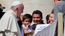 Pope Francis greets Swedish teenage environmental activist Greta Thunberg, right, during his weekly general audience in St. Peter's Square, at the Vatican, Wednesday, April 17, 2019. (AP Photo/Alessandra Tarantino)