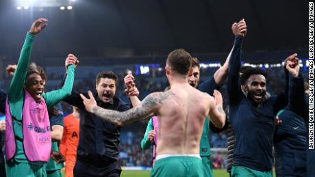 Mauricio Pochettino celebrated wildly with his players at full time.