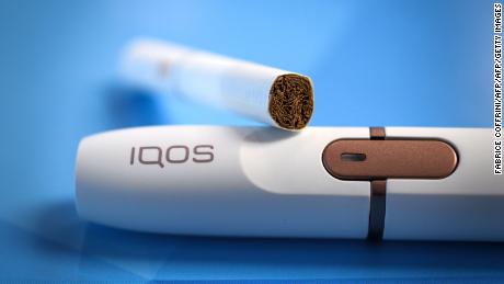 IQOS heats &quot;tobacco-filled sticks wrapped in paper to generate a nicotine-containing aerosol.&quot;