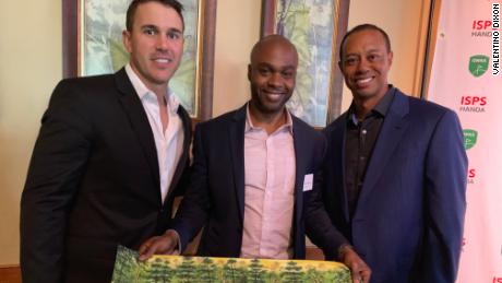 Valentino Dixon met Brooks Koepka (left) and Tiger Woods (right).