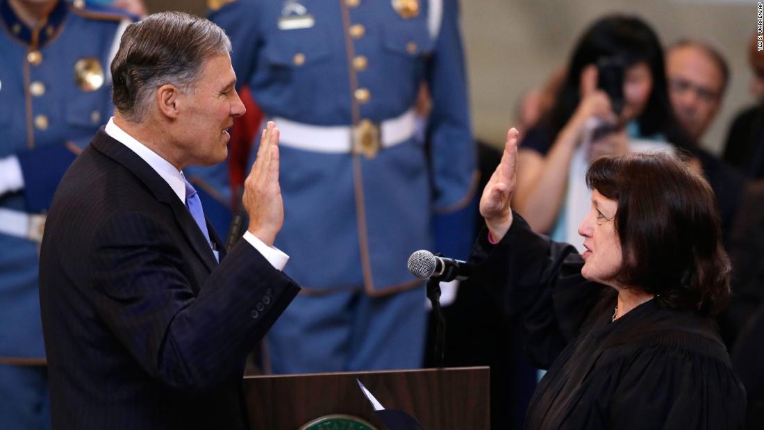 Inslee is sworn in as governor in January 2013.