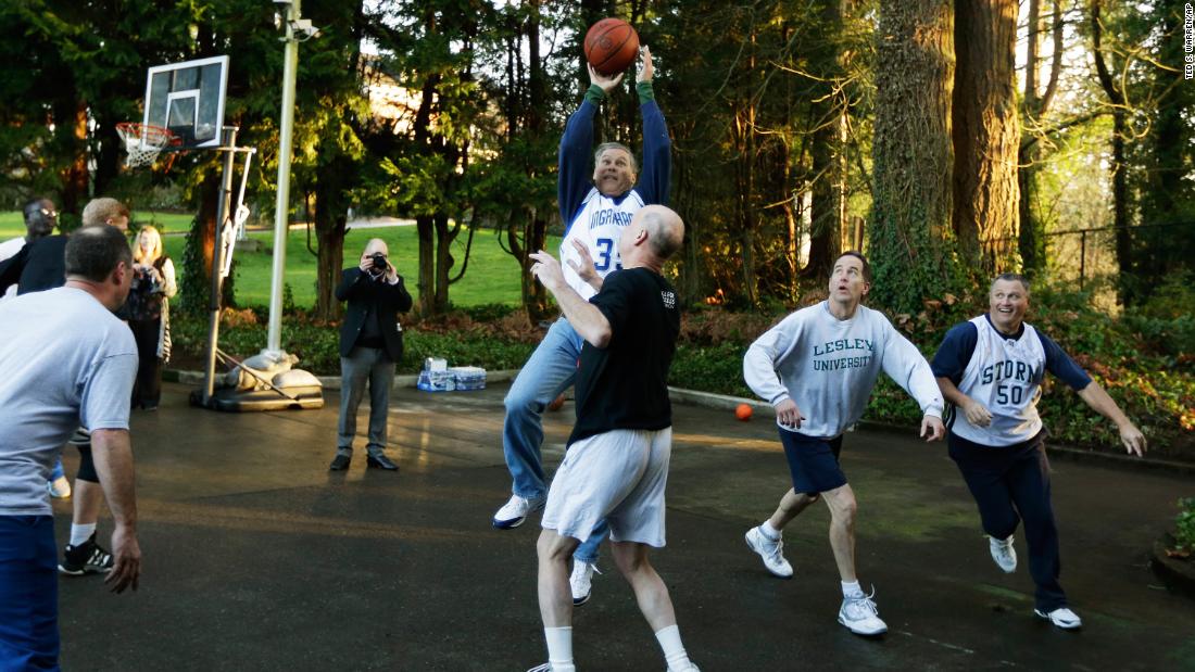 Inslee plays basketball at the governor&#39;s mansion on the day he was sworn in.