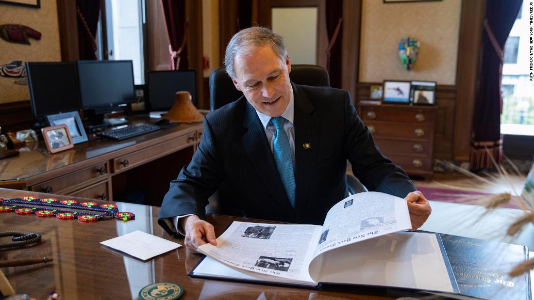 Inslee sits in his office in Olympia, Washington, in February 2019.