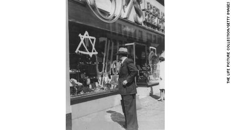 Before they had to give up their businesses, Jewish merchants in the Nazi era had to mark their stores with a Star of David and word Juden, which means &quot;Jews.&quot;