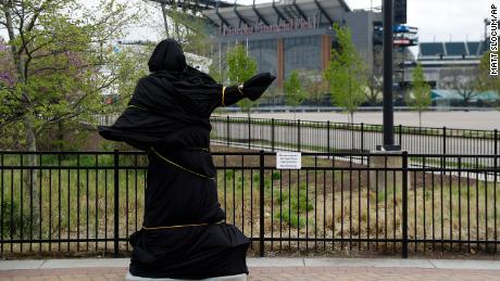 A covered statue of singer Kate Smith is seen near the Wells Fargo Center on April 19 in Philadelphia. 