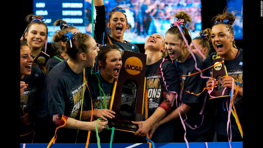 The team from the University of Oklahoma celebrates after winning the NCAA college women&#39;s gymnastics championship on Saturday, April 20, in Fort Worth, Texas.