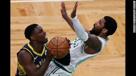 Darren Collison, left, of the Indiana Pacers, charges Kyrie Irving of the Boston Celtics during an April game in Boston.