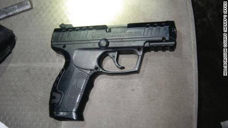 The realistic-looking airsoft pistol found in the fake deputy&#39;s vehicle.