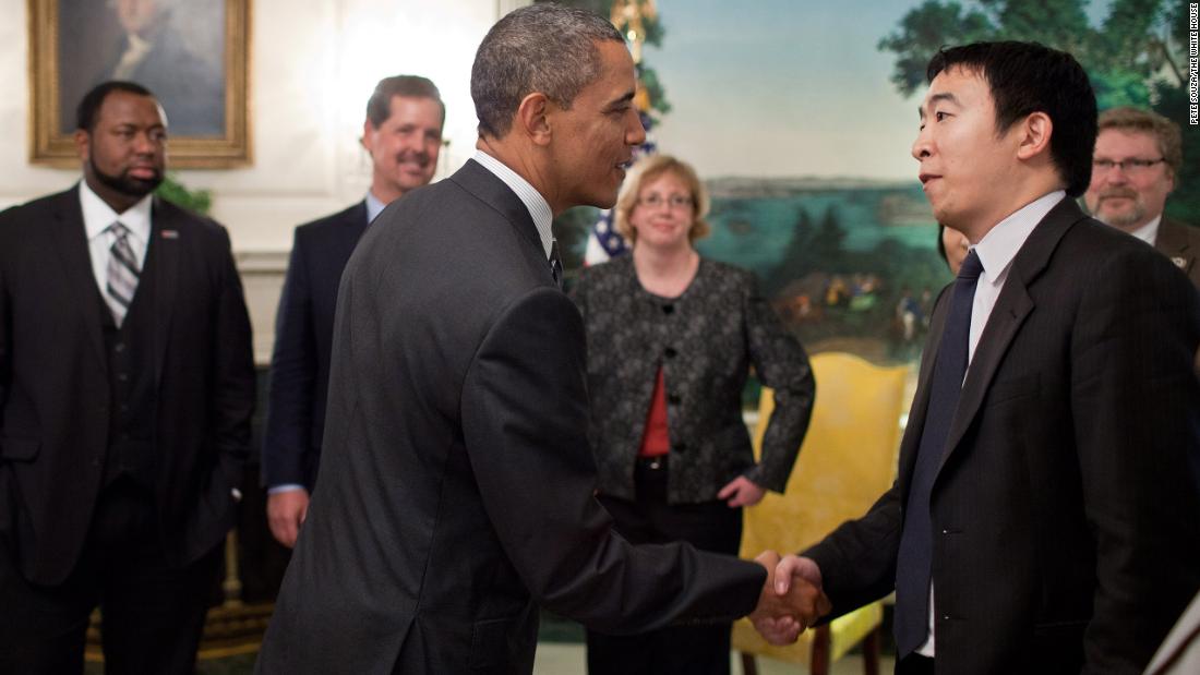 Yang is greeted by President Barack Obama in a White House reception room in 2012. Yang was among those honored as a &quot;Champion of Change.&quot; He started Venture for America, a fellowship program that aims to connect recent college graduates with startups.