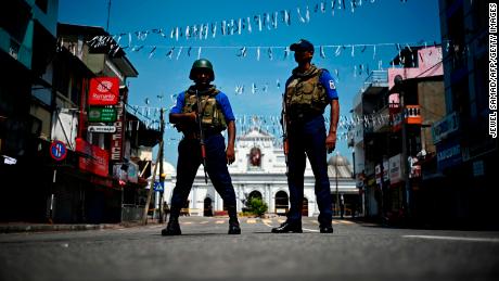 Security personnel stand guard near St. Anthony&#39;s Shrine, one of the Easter Sunday bombing sites.