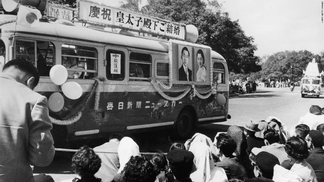 A First Aid bus with pictures of Japan&#39;s Crown Prince Akihito and his spouse Michiko Shoda celebrates their wedding on April 1959.