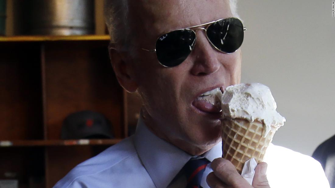 Biden gets ready to pay for an ice cream cone in Portland, Oregon, in October 2014. He was in Portland campaigning for US Sen. Jeff Merkley.