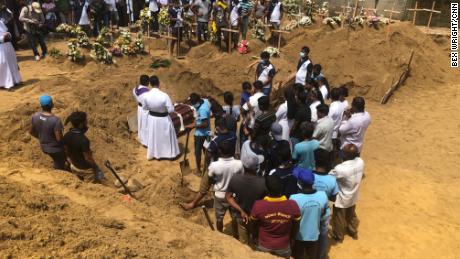 Many victims from the St Sebastian&#39;s Church attack have been laid to rest together in a mass burial site close to the church.