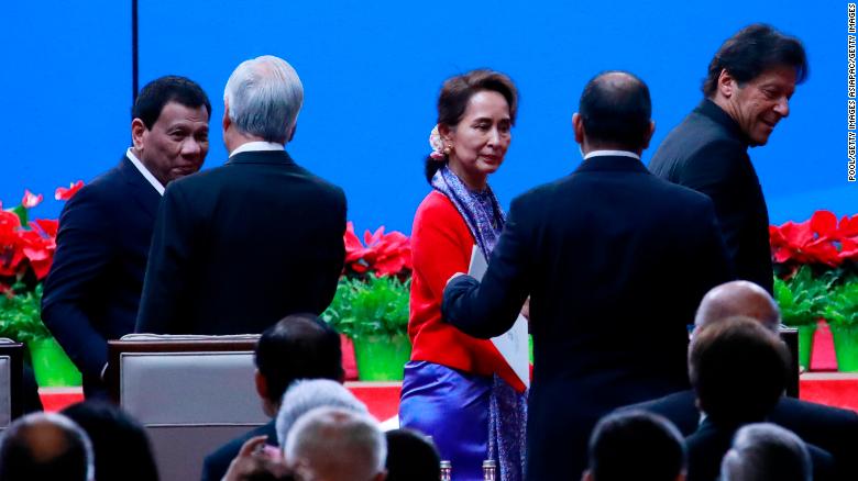  Philippines President Rodrigo Duterte (L), Myanmar State Councilor Aung San Suu Kyi (C) and Pakistani Prime Minister Imran Khan (R) arrive for the opening ceremony on April 26.