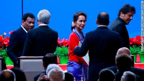 Philippines President Rodrigo Duterte (L), Myanmar State Councilor Aung San Suu Kyi (C) and Pakistani Prime Minister Imran Khan (R) arrive for the opening ceremony on April 26.