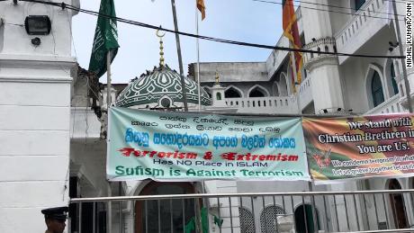 Signs outside the Dewatagaha Mosque in Colombo denounce the Easter Sunday attacks. 