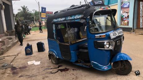 The rickshaw where a woman died in a Sri Lanka raid Friday night.