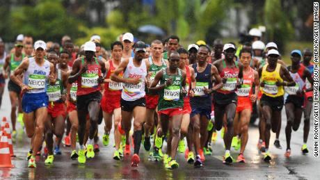 RIO DE JANEIRO, BRAZIL - AUGUST 21:  Abraham Niyonkuru of Burundi leads the pack during the Men&#39;s Marathon on Day 16 of the Rio 2016 Olympic Games at Sambodromo on August 21, 2016 in Rio de Janeiro, Brazil.  (Photo by Quinn Rooney/Getty Images)