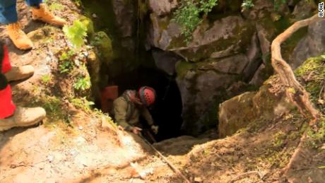 Rescuers enter a cave in southwest Virginia where five men are trapped on April 28, 2019.