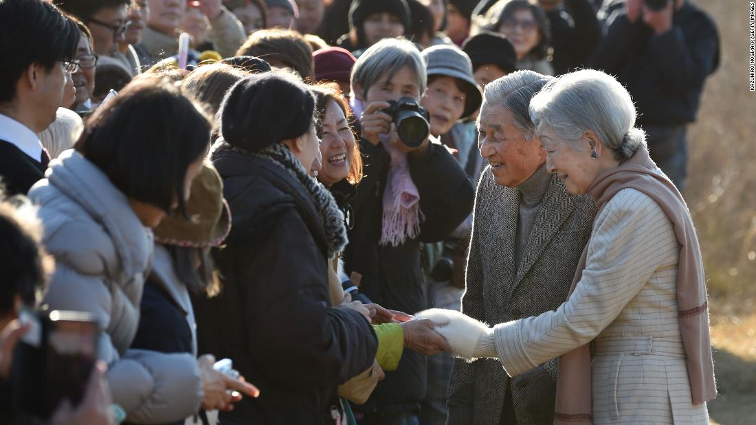 Akihito and Michiko meet well-wishers near the Hayama Imperial Villa.