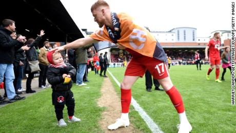 Dale Gorman celebrates with fans.