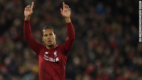 Liverpool&#39;s Dutch defender Virgil van Dijk acknowledges supporters during Liverpool&#39;s game against Huddersfield