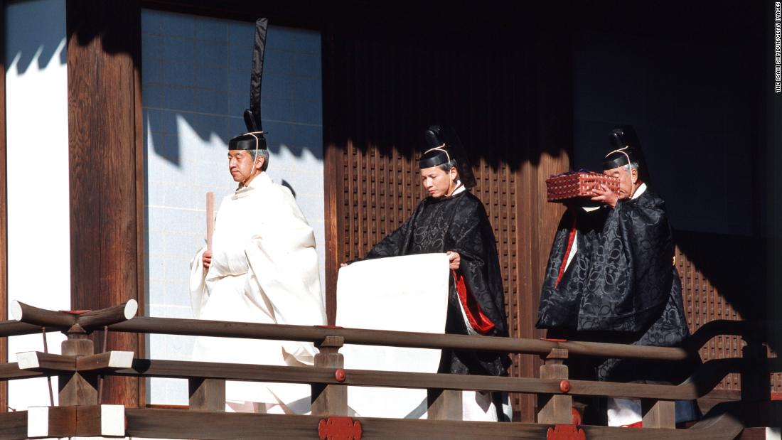 Akihito walks during his enthronement ceremony in 1990. A year and 10 months after the death of his father, Akihito officially became the 125th Emperor of Japan.