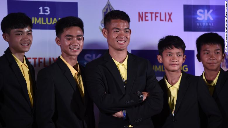 Members of the 'Wild Boars' team pose to promote a Netflix series about the rescue of the team.
