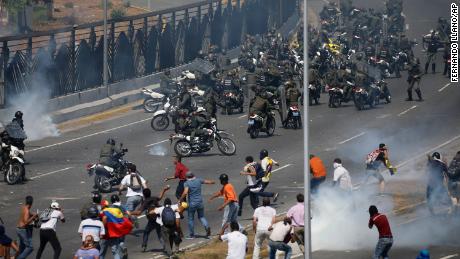 Graphic video captures the moment a vehicle plows into protestors in Venezuela.