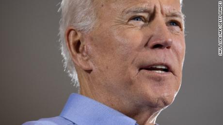 Biden downplays Chinese economic competition, drawing criticism from Republicans and Sanders