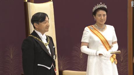 Emperor Naruhito stands with his wife, Empress Masako at a ceremony in the State Hall of Tokyo&#39;s Imperial Palace. 