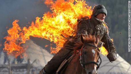 A stuntman performing during the World Nomad Games. Teams from Azerbaijan, Kazakhstan, Belarus, Mongolia and Tajikistan take part in the games.