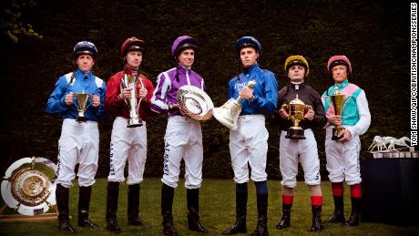 Six of the best jockeys in UK Flat racing line up with the trophies from the British Champions Series.