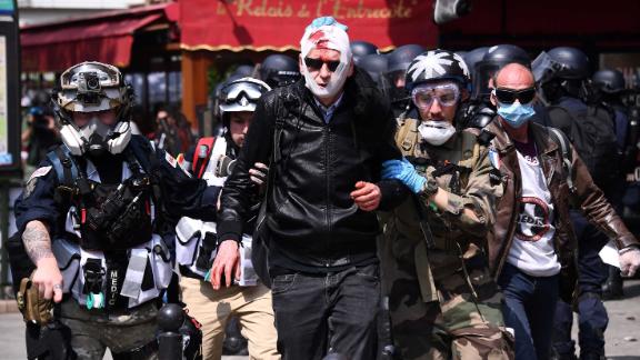 Paris May Day scuffles: Gilets jaunes join protesters as French police ...