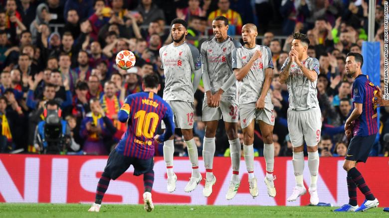 Messi scores his second goal in the 3-0 win over Liverpool.
