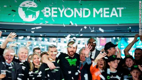 NEW YORK, NY - MAY 2: Beyond Meat CEO Ethan Brown (C) celebrates with guests after ringing the opening bell at Nasdaq MarketSite, May 2, 2019 in New York City. Valued at around $1.5 billion, Beyond Meat makes plant-based burgers and sausages. (Photo by Drew Angerer/Getty Images)