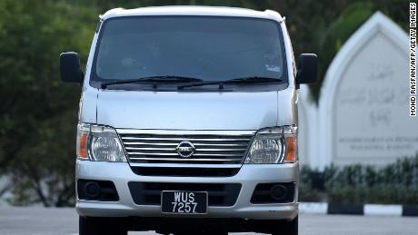 An immigration vehicle carrying Vietnamese national Doan Thi Huong leaves prison after she was released.