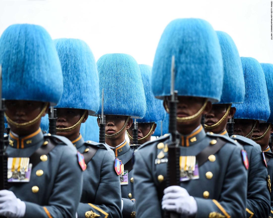 Thai Royal Guards march along a street near the Grand Palace during the coronation of the Thai King on Saturday, May 4.